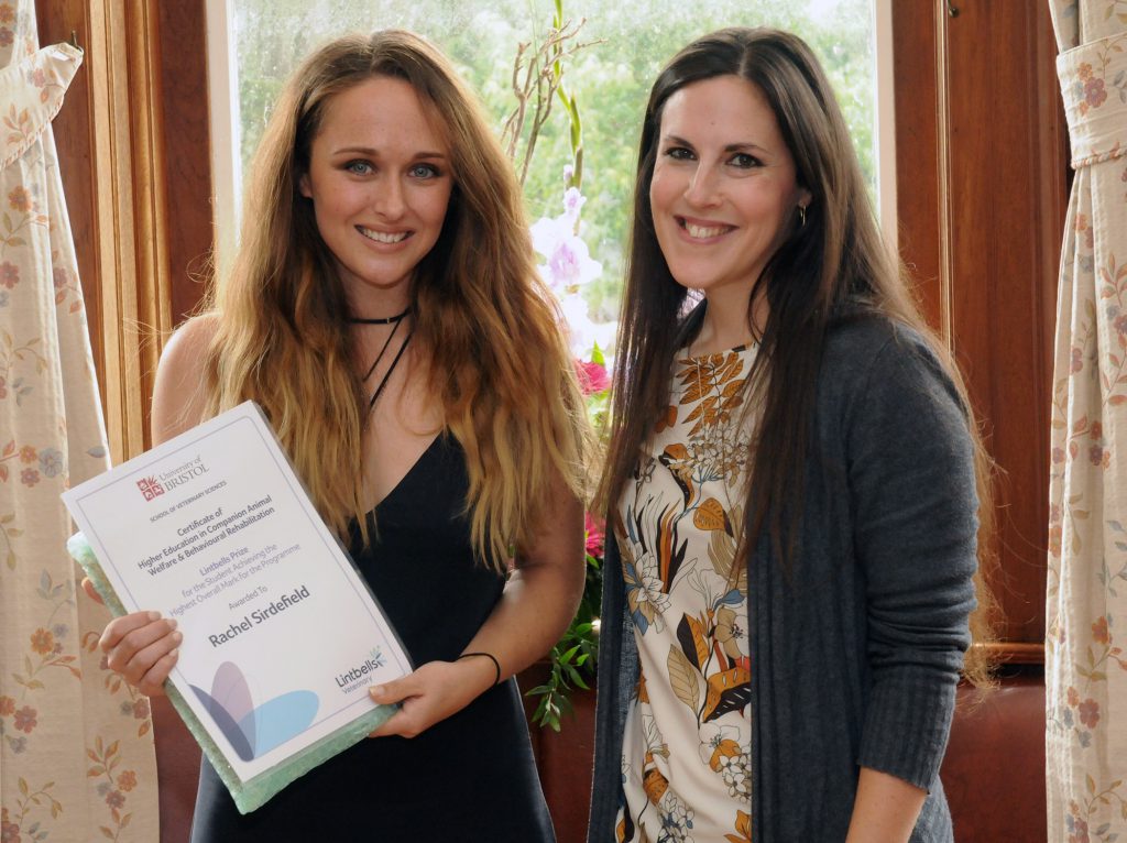 (left to right) Rachel Sirdefield, RSPCA Exeter, receives an award for Highest Overall Mark in the Certificate of Higher Education in Animal Welfare and Rehabilitation course from Helena Tallack